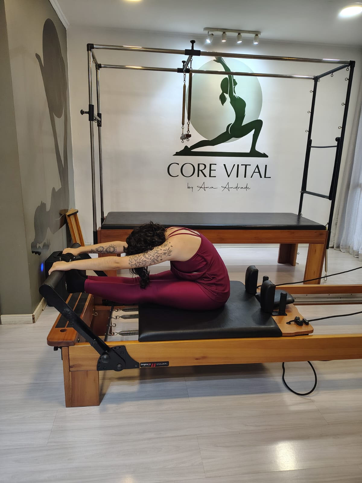 Cliente praticando Pilates